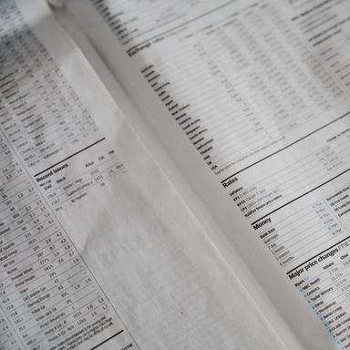 financial information in a newspaper